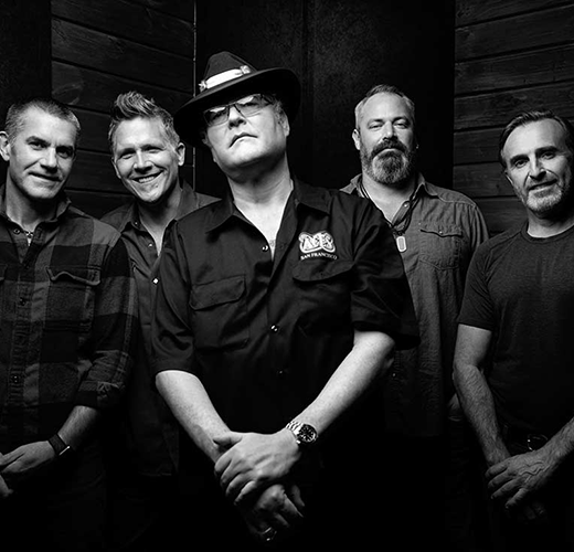 Members of Blues Traveler in black and white